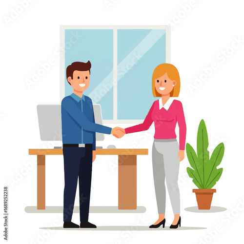 Two smiling business colleagues shake hands in a modern office, symbolizing a successful partnership and positive collaboration.