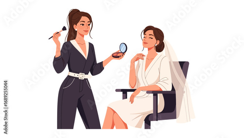 Professional makeup artist applying wedding makeup to a beautiful bride in a studio setting