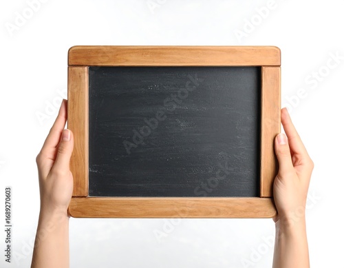 Hands holding a blank wooden-framed chalkboard (1)