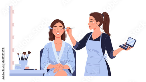 Professional makeup artist applying eyeshadow to a smiling woman in a beauty salon setting