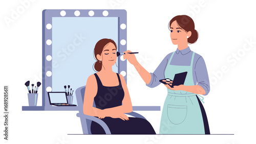 Professional makeup artist applying cosmetics to a client in a well lit studio setting