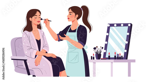 Professional makeup artist applying cosmetics to a client in a salon setting with a lighted mirror