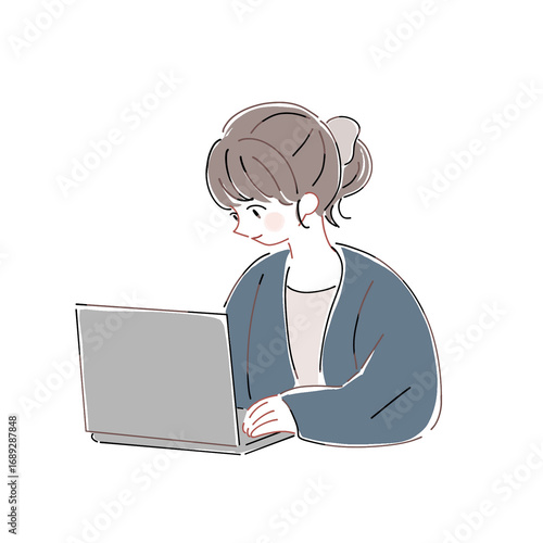 PCで仕事をしている女性