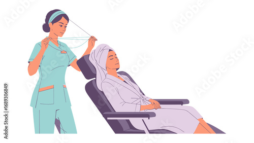Skilled cosmetologist applying a towel wrap to a client s head in a salon setting