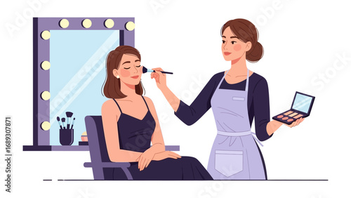 Professional makeup artist applying cosmetic blush to a client s face in a well lit vanity room