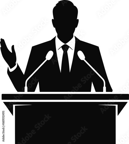 Man speaking at podium with microphones silhouette