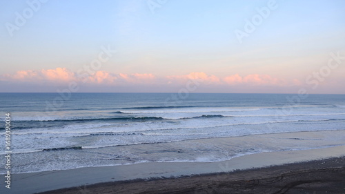 Wallpaper Mural Ocean waves rolling to shore with foamy surf, tranquil seascape and blue water horizon background Torontodigital.ca