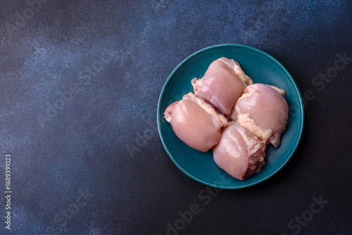 Chicken or turkey raw thigh fillet, skinless and boneless poultry meat. Chicken thigh fillet