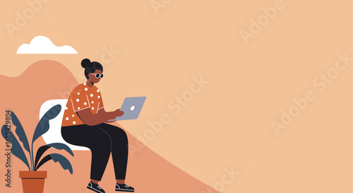 Focused person working on a laptop in a modern, casual setting. Ideal for themes of remote work, online learning, productivity, and a contemporary lifestyle.
