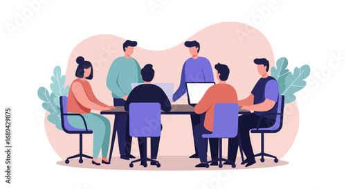 Business team collaborating in an office meeting. Professionals discussing ideas around a table with laptops, emphasizing teamwork and modern workplace productivity.