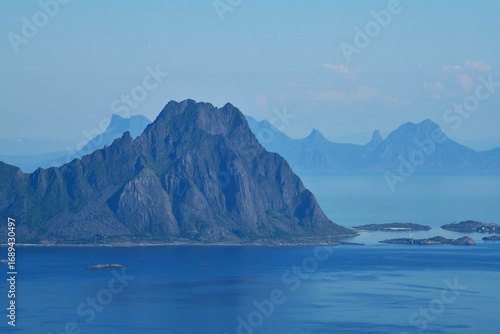 Scenic view of the mountainous islands in the Norwegian Sea (Vestfjorden) taken during Tjeldbergtinden hiking (Lofoten, Nordland county, Northern Norway)
