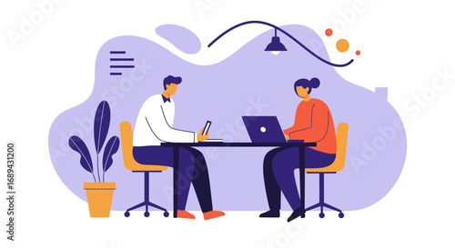 Professional colleagues collaborating at a desk, utilizing a laptop and tablet in a modern office or coworking space. Business concept.