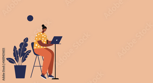 Dedicated person focused on work, using a laptop in a modern, casual setting. Represents remote work, productivity, and digital communication.