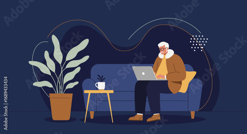 Senior man focused on laptop while sitting comfortably on a couch at home. Ideal for remote work, online education, or modern lifestyle concepts.