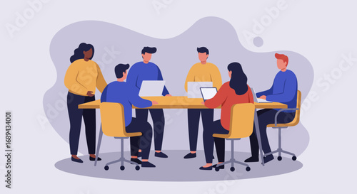 Diverse business team collaborating in a modern office meeting room, utilizing laptops and tablets for project discussion and brainstorming.