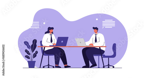 Two business professionals collaborating on laptops at a desk in a modern office. Ideal for concepts of teamwork, productivity, and remote work.