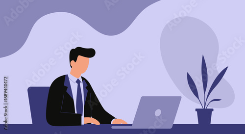 Professional man in a suit working diligently on a laptop at his desk, suitable for business, productivity, and modern workplace concepts.
