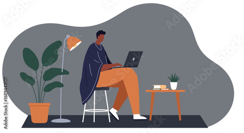 Man working remotely on a laptop at home, focused on online tasks. Represents freelance, e-learning, or modern work-life balance.