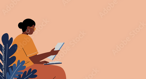 Woman focused on digital tasks using a laptop and tablet, representing remote work, online learning, or modern lifestyle. Ideal for business and education.