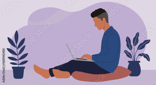 Man working on laptop at home, sitting comfortably with houseplants. Represents remote work, freelance, or online learning, showing modern lifestyle and flexibility.