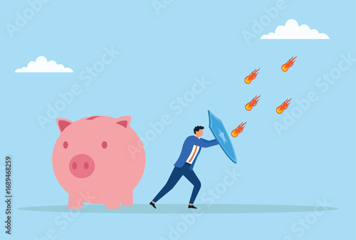 Vector illustration of a businessman using a shield to protect a piggy bank from falling fireballs, symbolizing financial protection, savings security, and defense against economic risks
