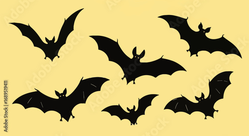 Set of Flying Bat Silhouettes for Halloween Decor. Spooky Nocturnal Animal Graphic Illustration Collection. Creepy Design Asset.