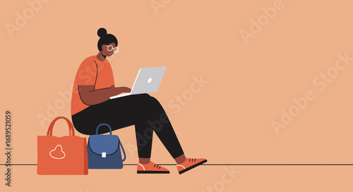 Young woman focused on her laptop, depicting remote work, online learning, or a digital lifestyle. Ideal for business and education concepts.