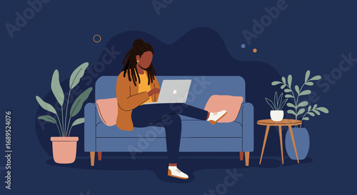 Focused woman with dreadlocks using a laptop on a sofa at home, depicting remote work, comfort, and productivity in a modern setting.