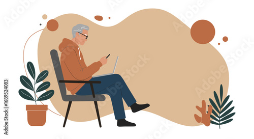 Happy senior man using laptop and smartphone at home. Modern elder enjoying digital communication and remote work in a comfortable setting.