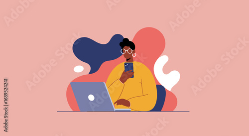 A focused person multitasking, working on a laptop while using a smartphone. Represents remote work, online communication, and modern digital lifestyle.