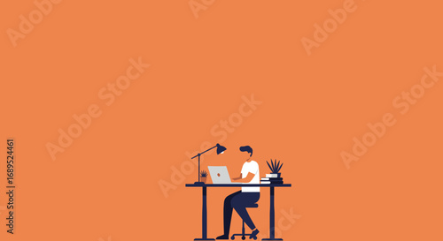 Young man working remotely on a laptop at a modern desk. Ideal for business, technology, education, and lifestyle themes.