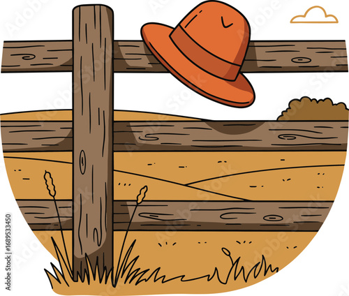Hat hanging on wooden fence in rural landscape with grass and hills  