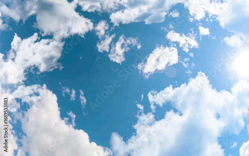 Sunny day sky blue and bright with pretty clouds. calm soothing environment, expansive overhead view. 