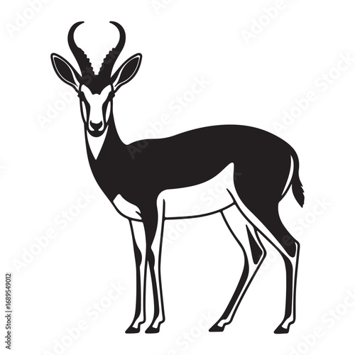 Silhouette of antelope with curved horns standing in savanna