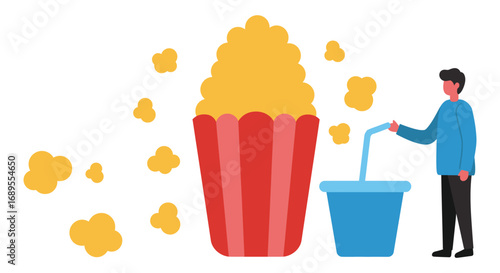 man pouring drink beside large popcorn bucket