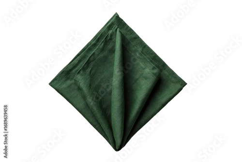 Dark green linen napkin folded into a diamond shape