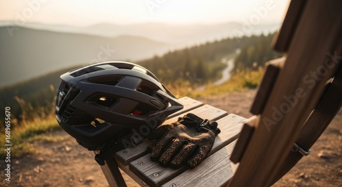 Mountain Biking Gear Resting on Wooden Chair with Scenic Mountain View