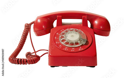 Vintage red rotary phone.  Isolated.  Retro