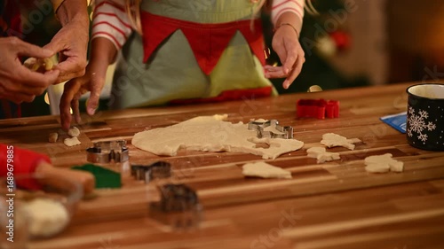 Family baking christmas cookies together
