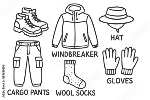 Travel Gear Doodles. Travel outfit doodles: hand drawn doodles of hiking boots, windbreaker, hat, cargo pants, wool socks, and
