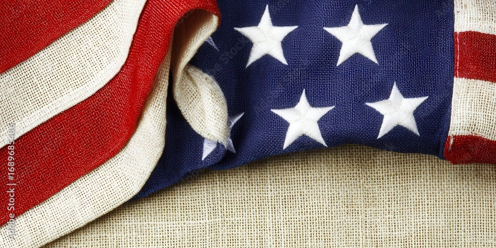 Fototapeta premium The American flag is artfully displayed, showcasing its iconic stars and stripes in close detail.