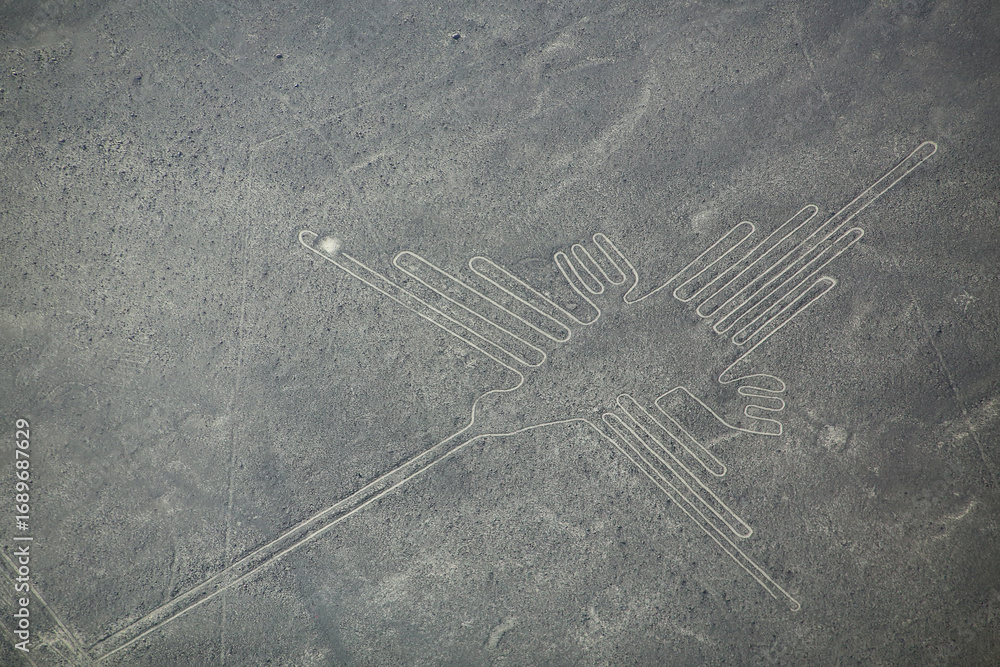 Naklejka premium Aerial view of Nazca Lines - Hummingbird geoglyph, Peru.