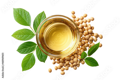 Soy oil in a clear bowl surrounded by soybeans and leaves