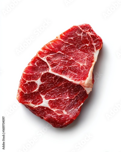 Fresh marbled beef steak with distinctive fat interspersed throughout the red meat on white background