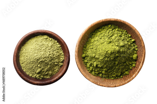 Two wooden bowls filled with green powder.  One bowl is larger than the other.  Both powders appear finely ground and uniform in color