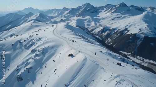 Skiers traverse stunning snowy mountain range