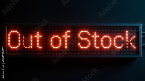 Out of stock red led digital sign glowing on dark background
