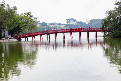 To enter the  Ngoc Son Temple, you need to cross The Huc Bridge. Built in 1865, this red bridge made of wood connects the bank with Ngoc Son Temple in the middle of Hoan Kiem Lake. Hanoi, Vietnam