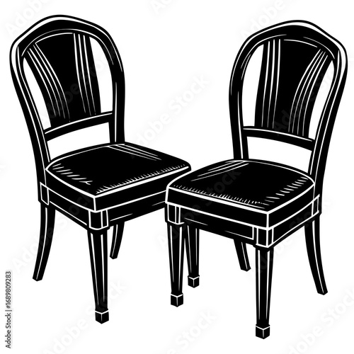 Elegant black dining chairs with classic carved details offer timeless sophistication for any refined interior setting or design project, creating inviting spaces.