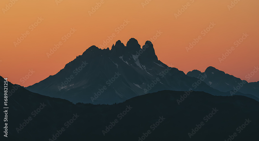Fototapeta premium Beautiful mountain silhouette against dramatic sky, scenic landscape view with nature horizon, minimal and peaceful outdoor background for travel and adventure concept.